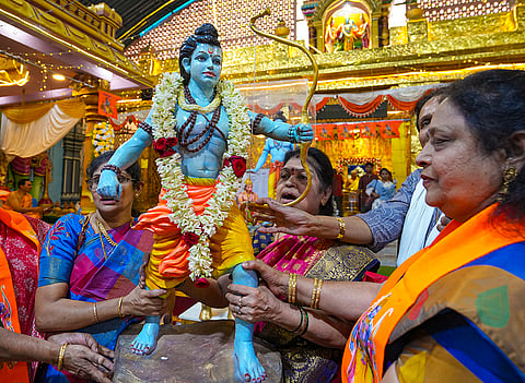 Devotees carry an idol of Lord Ram during the ‘Ram Navami’ festival, in Bengaluru.
