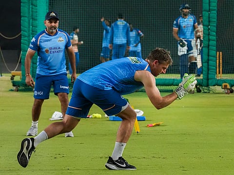 Gujarat Titans’ Jos Buttler, front, during a practice session ahead of the Indian Premier League (IPL) 2026 season, at Narendra Modi Stadium in Ahmedabad.