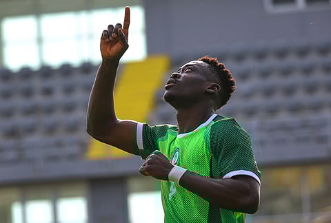 Nigeria's Akor Adams celebrates after scoring his side's second goal during a friendly soccer match between Iran and Nigeria in Antalya, southern Turkey.