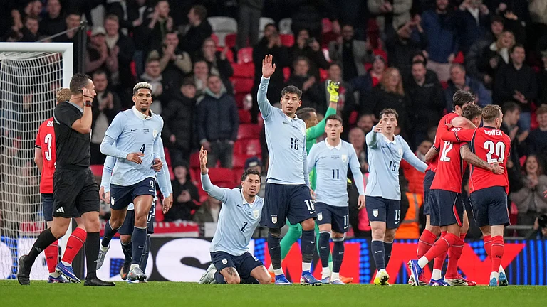 England's Ben White, second right, celebrates after scoring his side's opening goal during the international friendly match. - AP