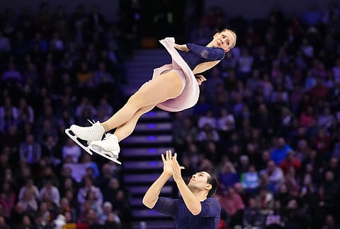 Minerva Fabienne Hase and Nikita Volodin of Germany perform during the pairs free skating at the Figure Skating World Championships in Prague, Czech Republic.