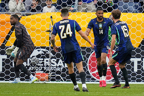 Brazil's Bremer, second right, celebrates after scoring his side's first goal during the international friendly soccer match between Brazil and France in Foxborough, Mass.