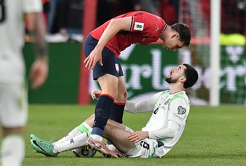 Czech Republic's Robin Hranac, top, argues with Ireland's Finn Azaz during a World Cup playoff semifinal soccer match between the Czech Republic and Ireland in Prague, Czech Republic.