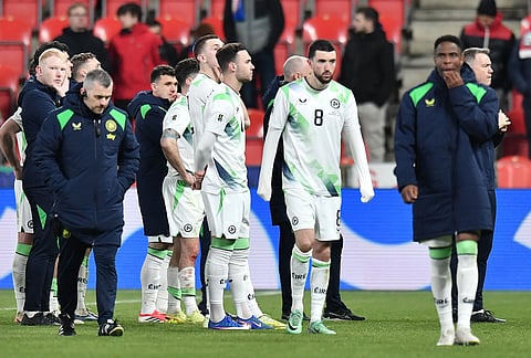 Itaeland's players walk off the pitch after a World Cup playoff semifinal soccer match between the Czech Republic and Ireland in Prague, Czech Republic.