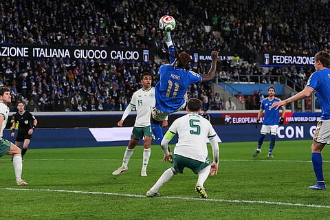 Italy's Moise Kean attempts top score with a bicycle kick during the World Cup qualifying play-off soccer match between Italy and Northern Ireland, in Bergamo, Italy.
