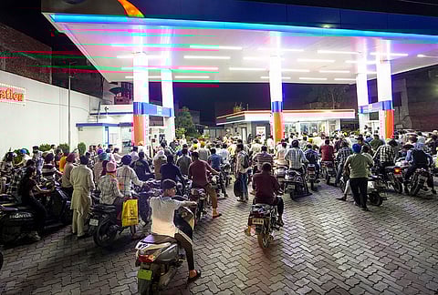 Consumers throng at a petrol station amid rumours of fuel shortages due to the war in West Asia, in Amritsar. India has about 60 days of fuel stock cover, the government said on Thursday, adding that there is no shortage of petrol, diesel, or LPG as it dismissed reports of shortages as a "deliberate misinformation campaign" aimed at triggering panic buying. 