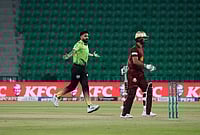 | Photo: AP/K.M. Chaudary : Lahore Qalandars' Haris Rauf, left, celebrates after taking the wicket of Hyderabad Kingsmen Hassan Khan, right, during the opening cricket match of the Pakistan Super League between Lahore Qalandars and Hyderabad Kingsmen, which taking place without spectators, in Lahore, Pakistan.