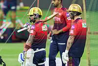 | Photo: PTI/Shailendra Bhojak : Royal Challengers Bengaluru’s Virat Kohli, left, and Phil Salt, right, during a practice session ahead of the Indian Premier League (IPL) 2026 cricket match against Sunrisers Hyderabad, at M. Chinnaswamy Stadium in Bengaluru.