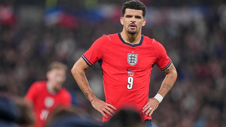 England's Dominic Solanke stands on the pitch during the international friendly soccer match. - AP/Alastair Grant