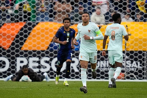 Kylian Mbappe of France runs during the international friendly soccer match between Brazil and France in Foxborough, Mass.