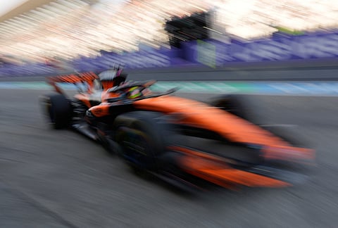 McLaren driver Oscar Piastri of Australia steers his car into the pit during the second practice session Japanese Formula One Grand Prix in Suzuka, Japan.