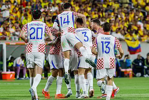 Croatia players celebrate after goal against Colombia during the first half of an international friendly soccer game, in Orlando, Florida.