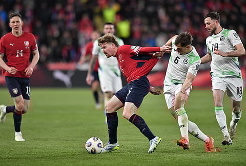 Czech Republic's Pavel Sulc, left, and Ireland's Jayson Molumby fight for the ball during a World Cup playoff semifinal soccer match between the Czech Republic and Ireland in Prague, Czech Republic.