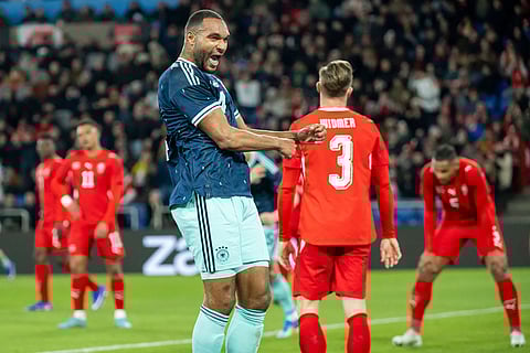 Germany's Jonathan Tah celebrates his goal during an international friendly soccer match between Switzerland and Germany in Basel, Switzerland.