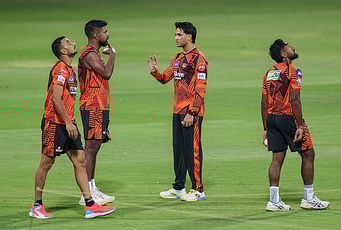 Sunrisers Hyderabad’s Abhishek Sharma, centre, Harshal Patel and others during a practice session ahead of the Indian Premier League (IPL) 2026 cricket match against Royal Challengers Bengaluru, at M. Chinnaswamy Stadium in Bengaluru.