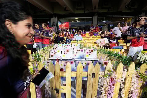 Eleven seats are kept at M Chinnaswamy Stadium as a tribute to 11 Royal Challengers Bengaluru fans who lost their lives in a stampede last year, as spectators wait for the Indian Premier League cricket match between Royal Challengers Bengaluru and Sunrisers Hyderabad to begin, in Bengaluru, India.