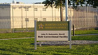 | Photo: AP/Jim Rassol : The Martin County Sheriff's Office welcome sign is displayed outside Friday, March 27, 2026 