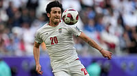 | Photo: AP/Aijaz Rahi : Iran's Sardar Azmoun controls the ball during the Asian Cup quarterfinal soccer match between Japan and Iran at Education City Stadium in Al Rayyan, Qatar, Saturday, Feb. 3, 2024.