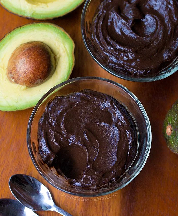 Two bowls of avocado chocolate mousse