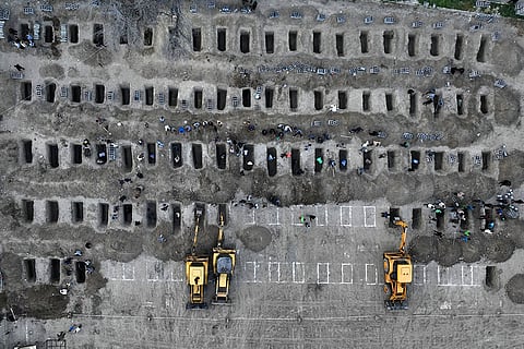 The coffins of students killed in an Israel-US attack on a girls primary school are seen during a mass funeral ceremony in Minab, Hormozgan, Iran.