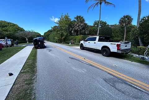 This photo provided by the Martin County Sheriff's Office shows skid marks near the overturned vehicle in a rollover crash which involved Tiger Woods in Jupiter Island, Florida.