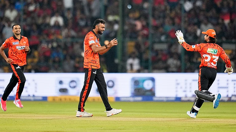 Sunrisers Hyderabad's Jaidev Unadkat, center, celebrates with teammates the wicket of Royal Challengers Bengaluru's Phil Salt during the Indian Premier League cricket match between Royal Challengers Bengaluru and Sunrisers Hyderabad in Bengaluru, India, Saturday, March 28, 2026. - AP Photo/Aijaz Rahi
