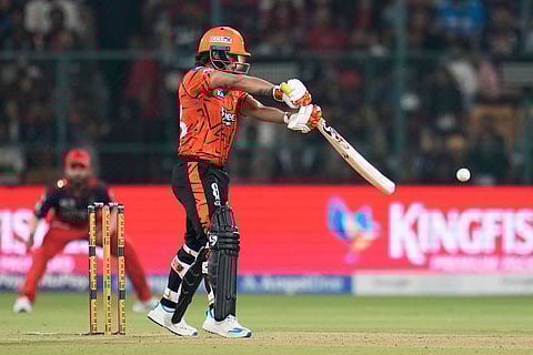 Sunrisers Hyderabad's captain Ishan Kishan plays a shot during the Indian Premier League cricket match between Royal Challengers Bengaluru and Sunrisers Hyderabad in Bengaluru, India.