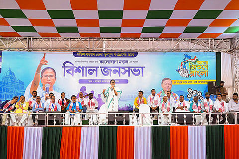 In this image posted on March 28, 2026, West Bengal Chief Minister Mamata Banerjee addresses a gathering during a public meeting, in Raniganj, West Bengal. 