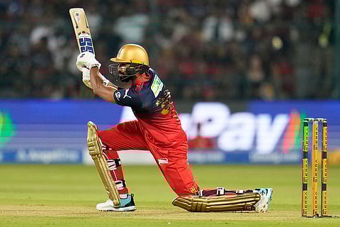 Royal Challengers Bengaluru's Devdutt Padikkal plays a shot during the Indian Premier League cricket match between Royal Challengers Bengaluru and Sunrisers Hyderabad in Bengaluru, India.
