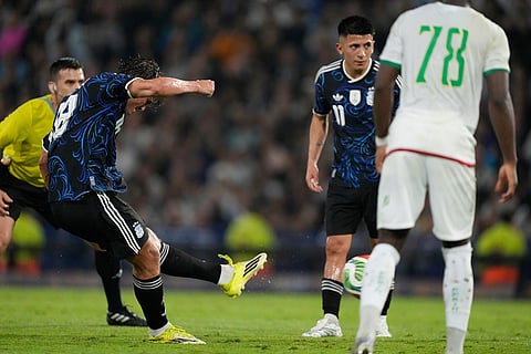 Argentina's Nicolas Paz scores his side's second goal against Mauritania during a friendly match in Buenos Aires, Argentina.
