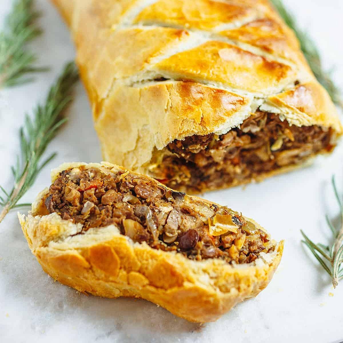Golden-brown veggie Wellington with rosemary