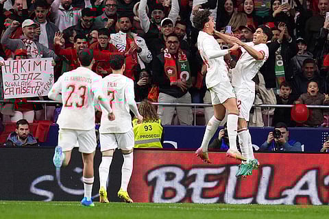 Morocco players cekebrate after a goal during a friendly soccer match between Morocco and Ecuador in Madrid, Spain,