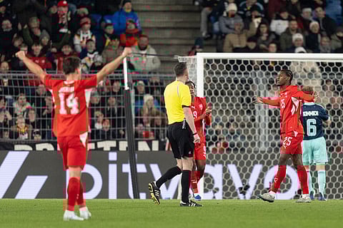 Switzerland's Joel Monteiro, right, celebrates his goal after scoring the third goal for Switzerland during an international friendly soccer match between Switzerland and Germany in Basel, Switzerland.