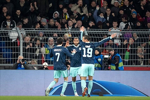 Germany's Jonathan Tah,center celebrates his goal after scoring the first goal for Germany with, Germany's Kai Havertz, left and Germany's Leroy Sane, right, during an international friendly soccer match between Switzerland and Germany in Basel, Switzerland.