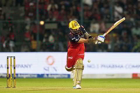 Royal Challengers Bengaluru's Virat Kohli plays a shot during the Indian Premier League cricket match between Royal Challengers Bengaluru and Sunrisers Hyderabad in Bengaluru, India.