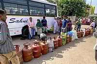 | Photo: PTI/Arvind Kumar : People queue up to avail LPG cylinders amid ongoing supply crunch, in Dilshad Colony, New Delhi.