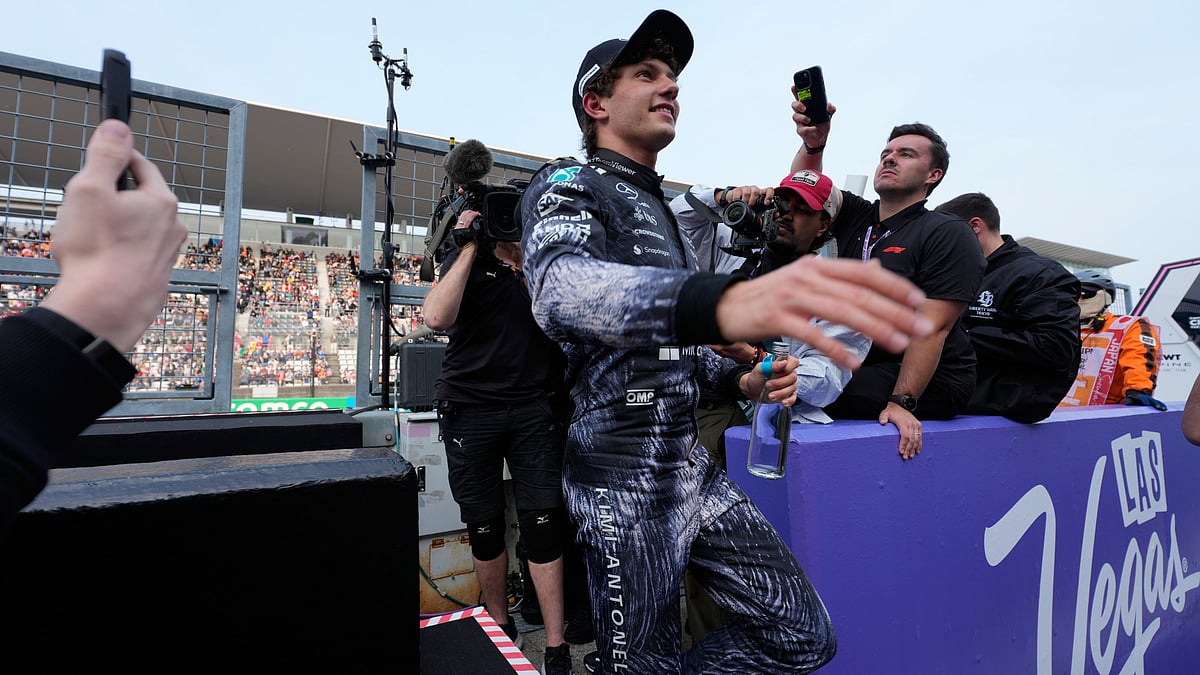 Mercedes driver Kimi Antonelli of Italy celebrates after he clocked the fastest time in the qualifying session of the Japanese Formula One Grand Prix at the Suzuka Circuit in Suzuka, Japan, Saturday, March 28, 2026.  - | Photo: AP/Eugene Hoshiko