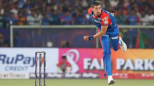 | Photo: AP/Surjeet Yadav : IPL 2025: Mitchell Starc in action during LSG vs DC match.