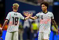 USA 2-5 Belgium, International Friendly: Belgian Red Devils Thrash Americans In 7 Goal Thriller | Photo: AP/Mike Stewart : Belgium's Joaquin Seys (18) and Axel Witsel celebrate after defeating the United States in an international friendly soccer match in Atlanta.