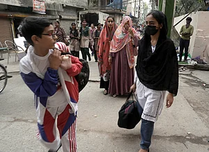 Family evacuating Uttam Nagar after threat of violence in Ramzan