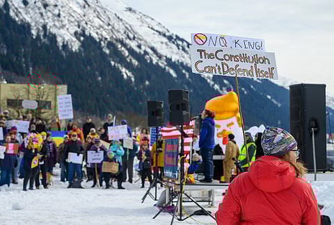 Demonstrators participate in a "No Kings" protest in Juneau, Alaska.
