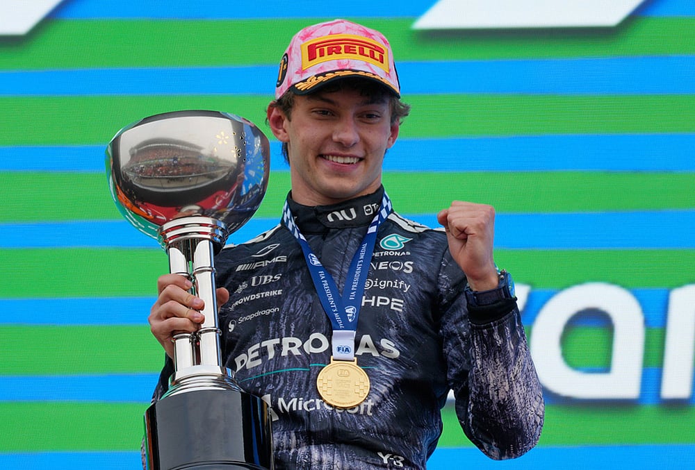 Mercedes driver Kimi Antonelli of Italy reacts on the podium after winning the Japanese Formula One Grand Prix at Suzuka in central Japan. - | Photo: AP/Eugene Hoshiko