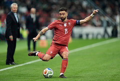 Portugal's Bruno Fernandes passes the ball during the international friendly soccer match between Mexico and Portugal in Mexico City.