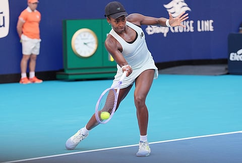Coco Gauff returns to Aryna Sabalenka during the women's singles final at the Miami Open tennis tournament, in Miami Gardens, Florida.