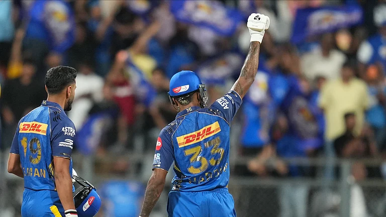 Mumbai Indians' captain Hardik Pandya, right, and Naman Dhir celebrate after won the match during the Indian Premier League cricket match between Mumbai Indians and Kolkata Knight Riders in Mumbai, India, Sunday, March 29, 2026. - (AP Photo/Rafiq Maqbool)