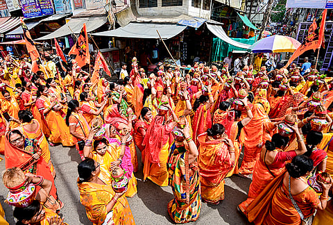 Women take part in a 'Kalash Yatra' religious procession, in Prayagraj, Uttar Pradesh.