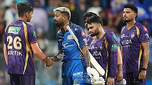 | Photo: AP/Rafiq Maqbool : Mumbai Indians' captain Hardik Pandya, second left, shake hands with Kolkata Knight Riders' Kartik Tyagi after won the match during the Indian Premier League cricket match between Mumbai Indians and Kolkata Knight Riders in Mumbai.