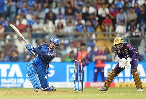 Mumbai Indians' Ryan Rickelton plays a shot during the Indian Premier League cricket match between Mumbai Indians and Kolkata Knight Riders in Mumbai.