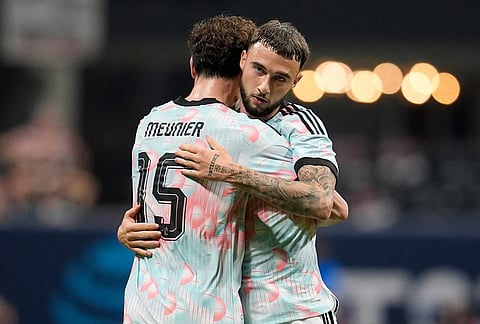 Belgium's Zeno Debast, right, celebrates with Thomas Meunier after scoring a goal against the United States during an international friendly soccer match, in Atlanta.