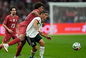 | Photo: AP/Fernando Llano : Mexico's German Berterame, right, is challenged by Portugal's Renato Veiga during the international friendly soccer match between Mexico and Portugal in Mexico City.